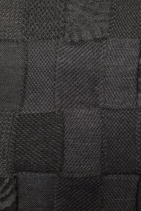 Close up of the pattern of the Charcoal Black Royal Alpaca and Merino Textured Wrap
