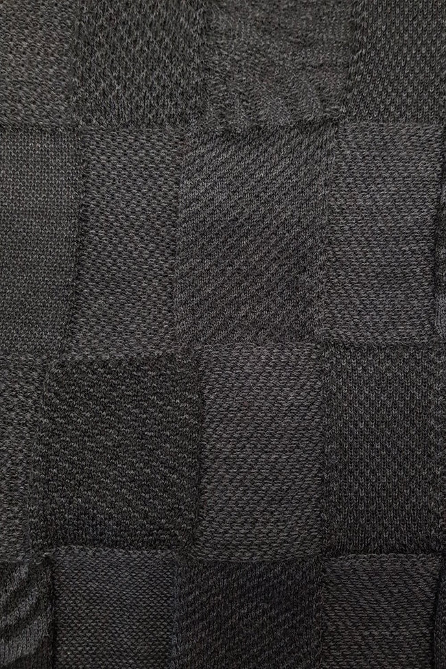 Close up of the pattern of the Charcoal Black Royal Alpaca and Merino Textured Wrap