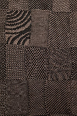 Close up of the pattern of the Cinamon Black Royal Alpaca and Merino Textured Wrap
