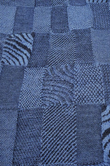 Close up of the pattern of the Denim Black Royal Alpaca and Merino Textured Wrap